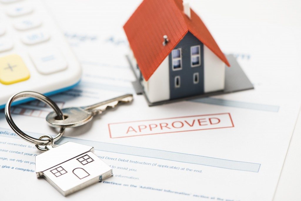 House keys and approved mortgage form
