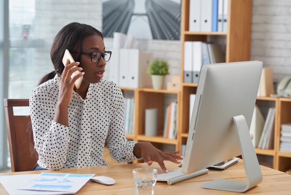 African-American female entrepreneur talking on the phone