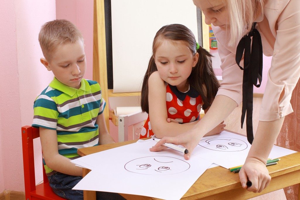 children being taught at school