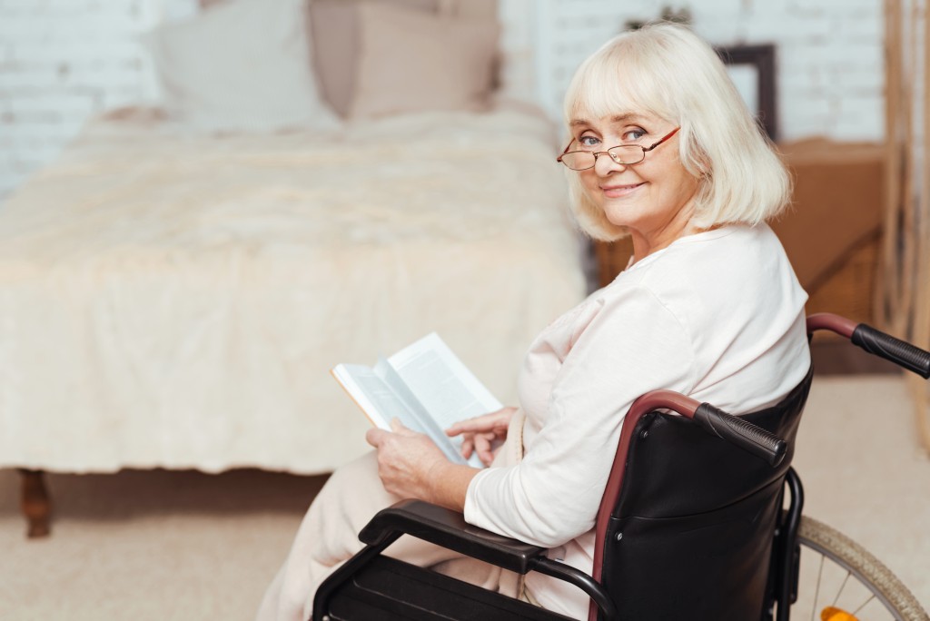 senior reading a book