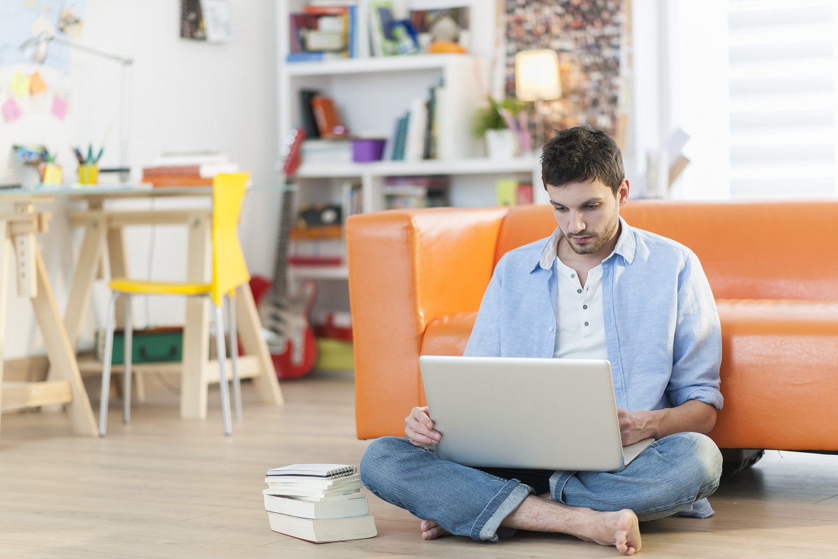 man studying online