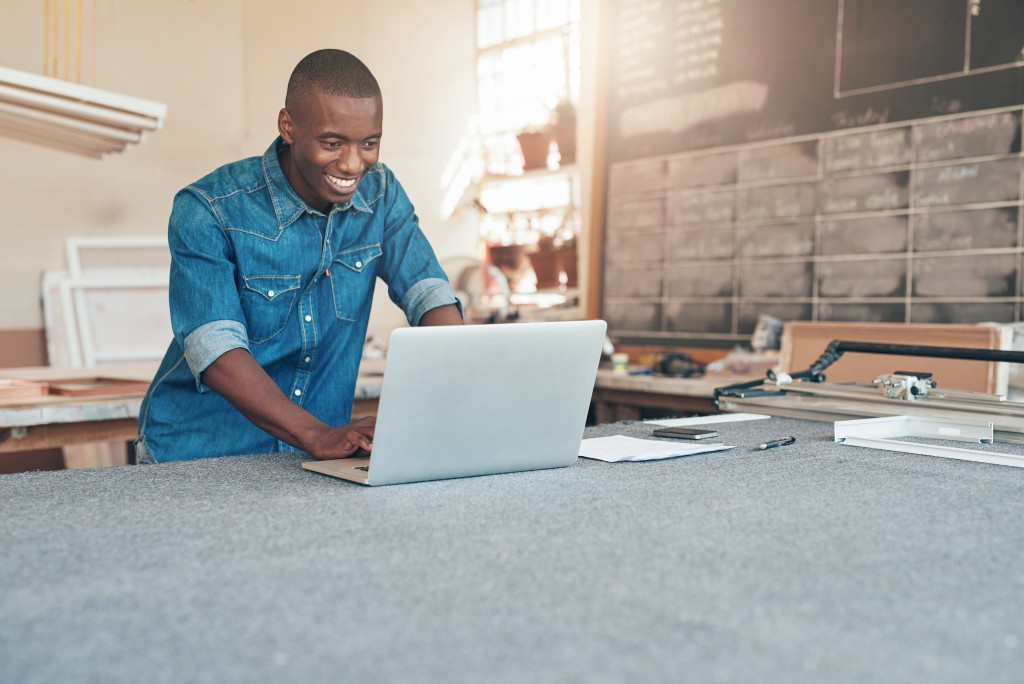 man working on laptop