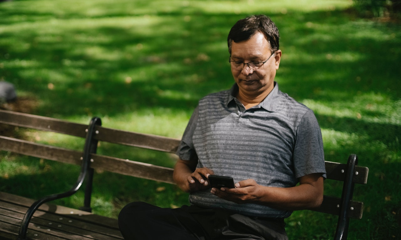 man browsing on his phone