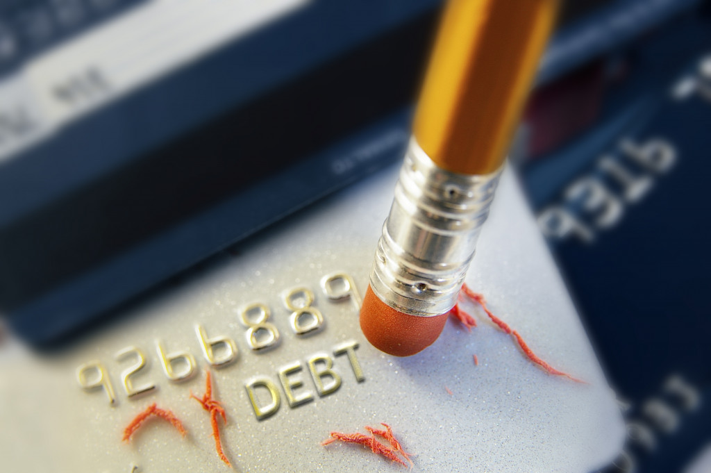 erasing debt debit card