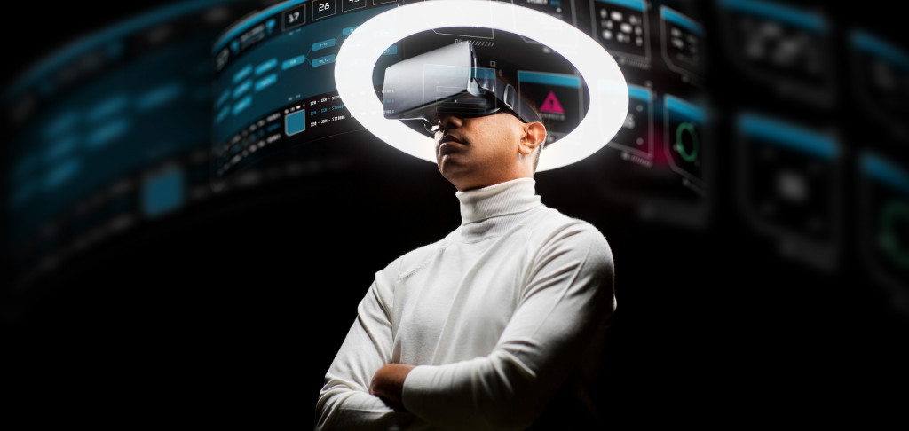  man in vr glasses under white illumination 