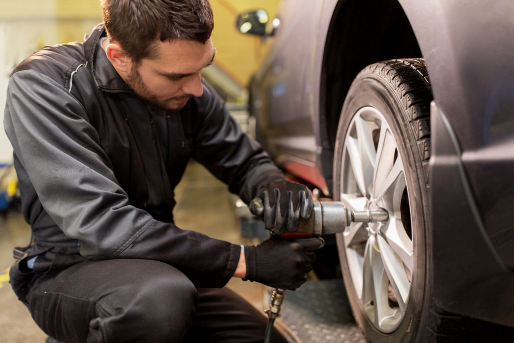 Mechanic repairing EV tires