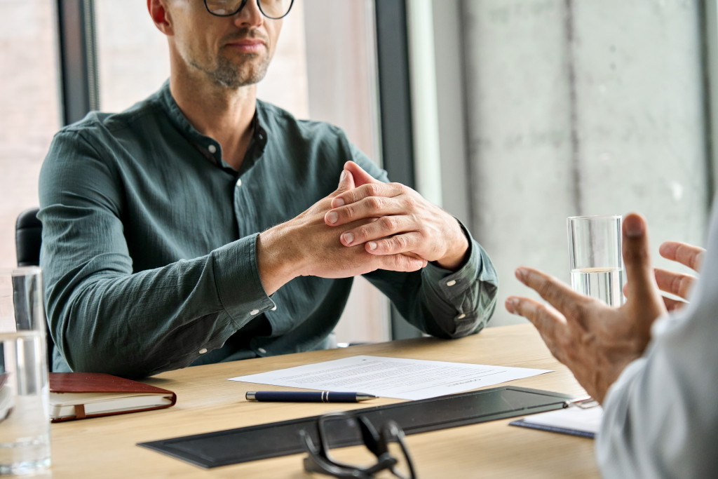 workplace conflict lawyer listening to the problem