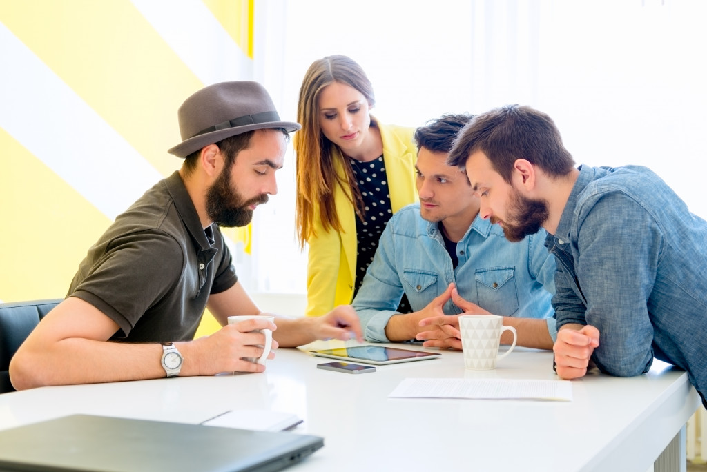 employees brainstorming in a table 