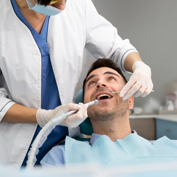 Dentist doing a check up on the patient